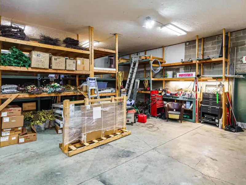 Prime Commercial Building in Downtown Reynoldsburg with Parking and Industrial Garage
