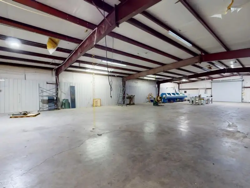 Commercial Property on Busy Highway - 2.1 Acres, 31,000 Sq Ft with Offices and Roll-up Doors