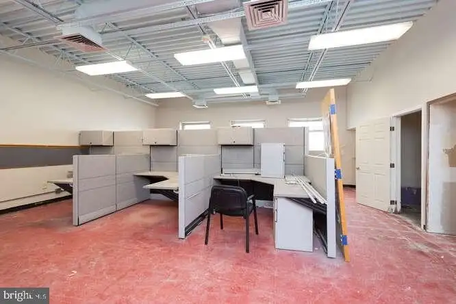 Versatile 6,000 Sq Ft Commercial Space in Prime Location with Parking Potential