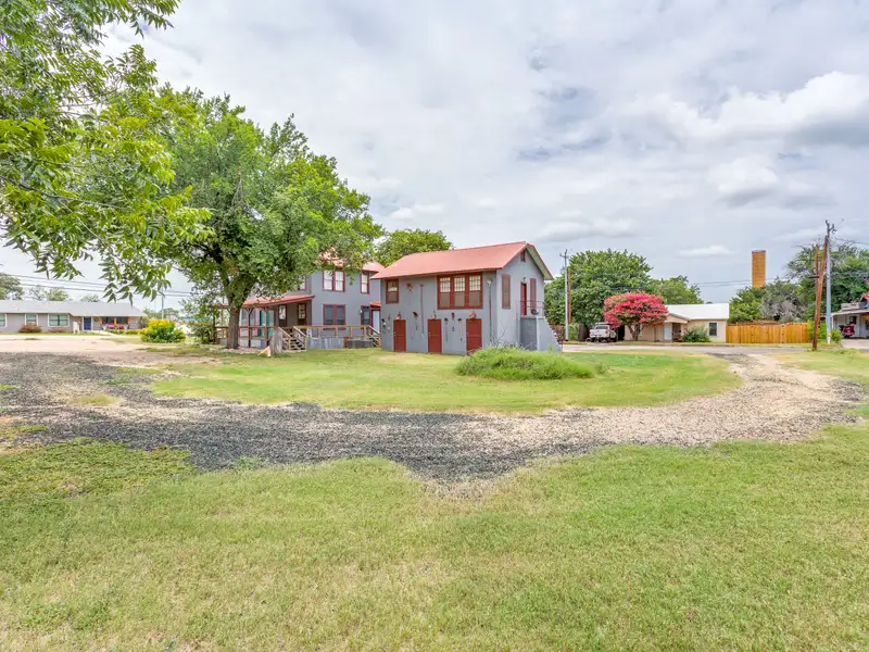 Historic Two-story Commercial Building with Garage Loft Apartment in Prime Location