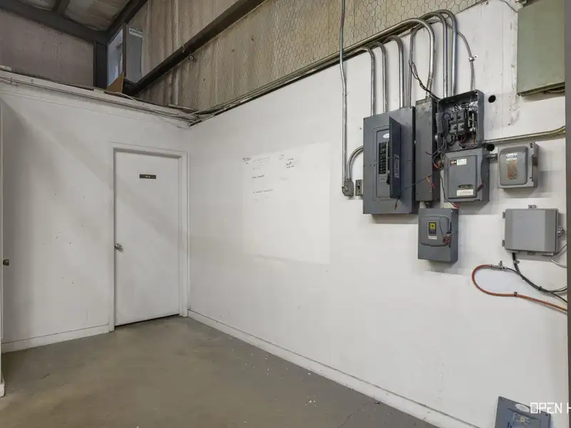 Insulated Warehouse and Office Space with Crane, Fenced Yard in Prime Location