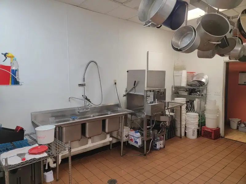 Investment Opportunity: Restaurant with Apartment and Additional Parking Near I-74
