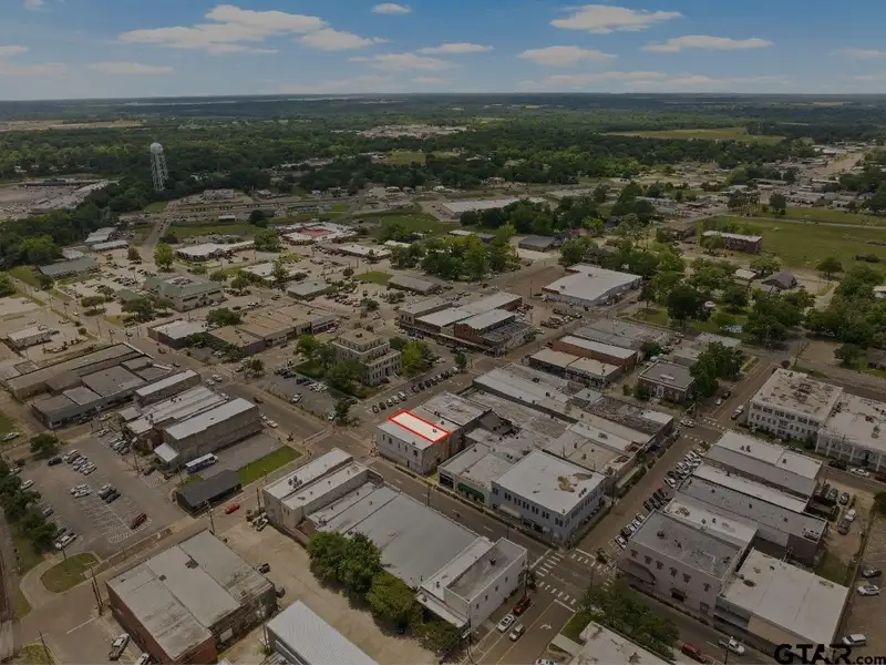 Unfinished Downtown Commercial Building with High Traffic Visibility and Mixed-use Potential