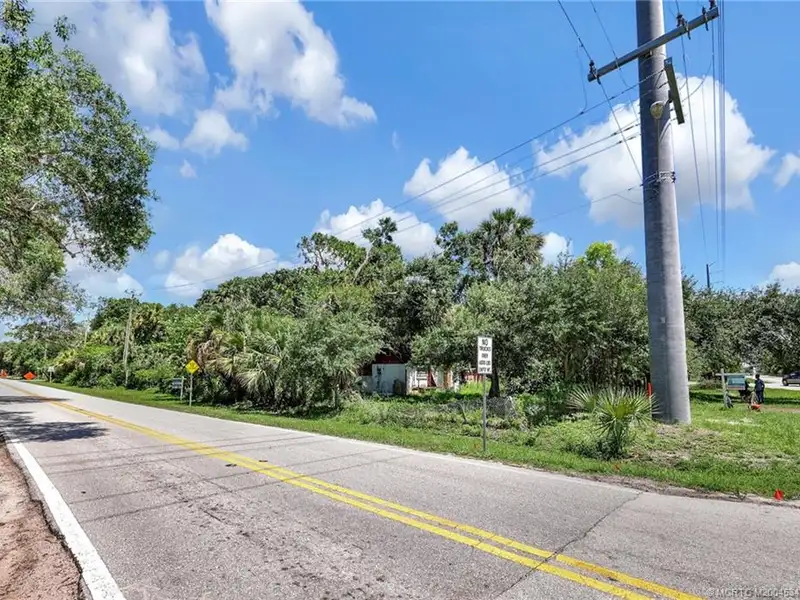 Commercial Corner Lot with Existing Residence in Lakewood Park, 31,140 Sq Ft