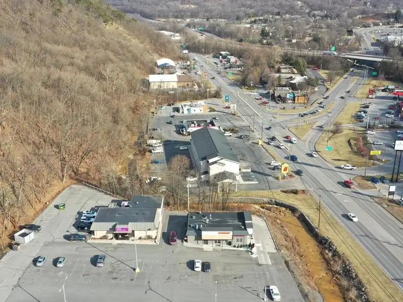 Versatile Commercial Property with Showroom, Offices, and Large Metal Building in Prime Location