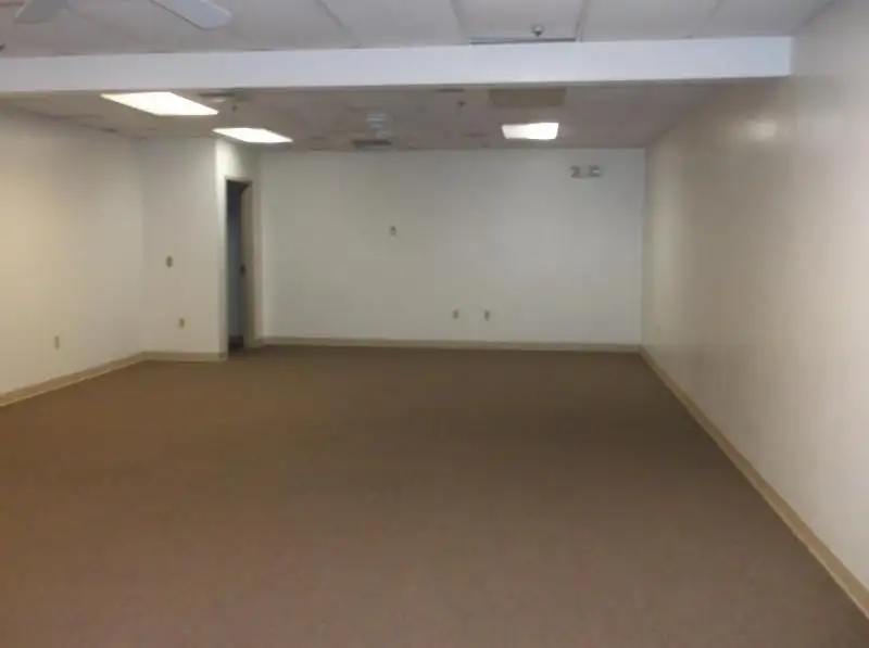 14,000 Sf Two-story Building in Omro with 20+ Rooms and Parking Lot Available