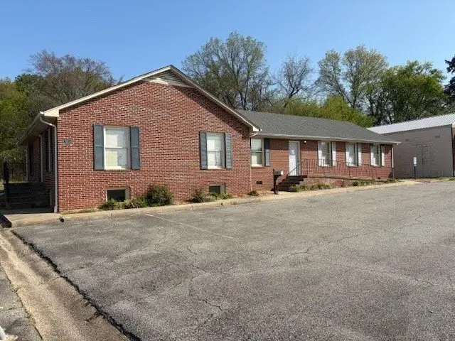 Versatile 2352 Sq. Ft. Brick Ranch Office Building in Virginia with Ample Parking