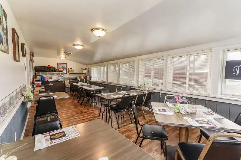Turnkey Bar/restaurant/hotel on Hwy 11 with Private Living Quarters and Outdoor Beer Garden