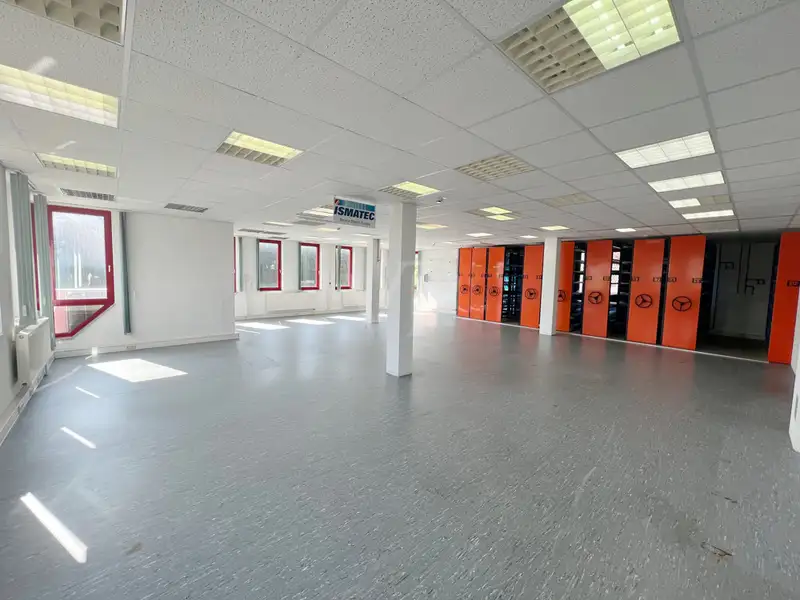 Versatile Company Building with Apartments, Offices, and Storage in Prime Location