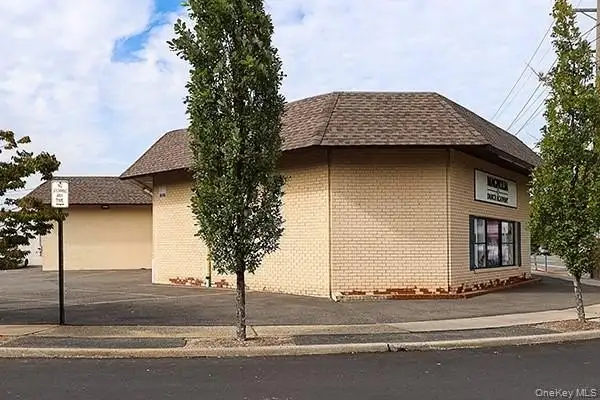 Well-maintained 7000 Sq Ft Retail/industrial Building with Multiple Suites on Merrick Road