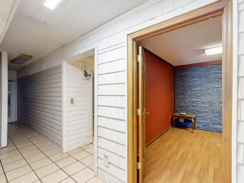 Commercial Property on Busy Highway - 2.1 Acres, 31,000 Sq Ft with Offices and Roll-up Doors