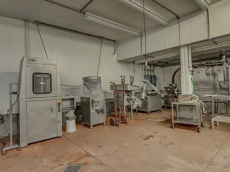 Fully Leased Restaurant and Meat Processing Facility with Equipment in Prime Location