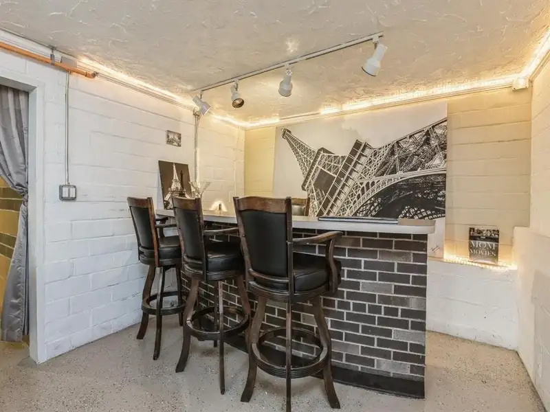 Vintage 4-bedroom Beaverdale Brick Home with Office Suites in Historic Valley Junction
