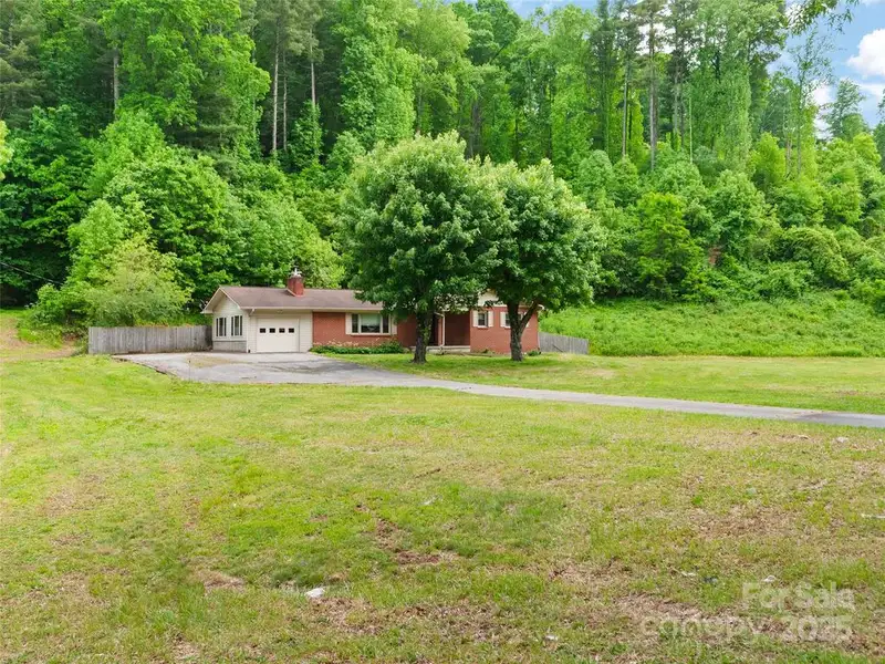 Prime 1.8 Acre Commercial Property with Home in Waynesville, Nc on Major Corridor