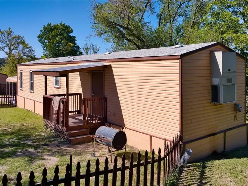 10-acre Mobile Home Community with 5 Units, Fenced, Workshop, and Growth Potential