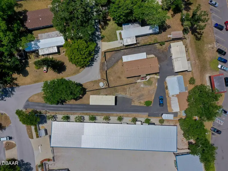 Mixed Use Property: Light Industrial Lot with Adjoining Residential Home and Expansion Potential