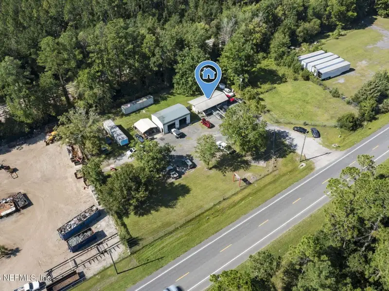 Mixed-use Parcel with Buildings, Ideal for Auto Repair or Sales in Convenient Location