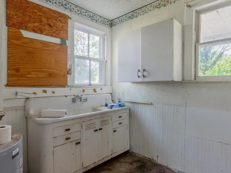 Classic American Foursquare Home in Need of Restoration with Detached Garage