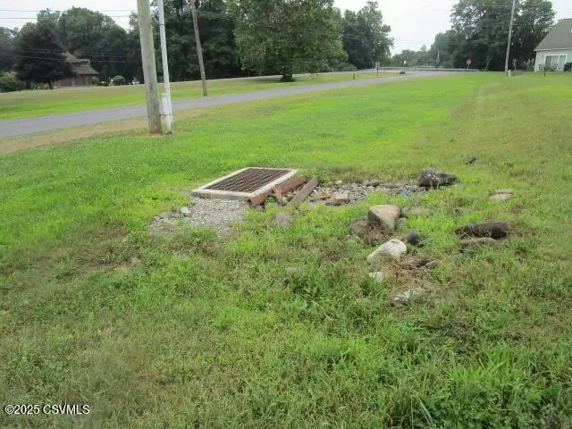 Partially Built Condo Development with Approved Plans in Picturesque Location