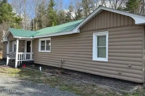 Versatile Commercial/residential Property with 2-bed Apartment and Office/retail Space on Route 6