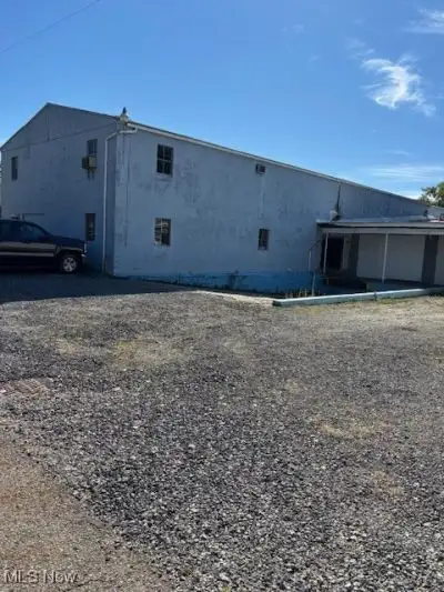 Multi-parcel Commercial Property with Storage and Rustic Office Space on 0.76 Acres