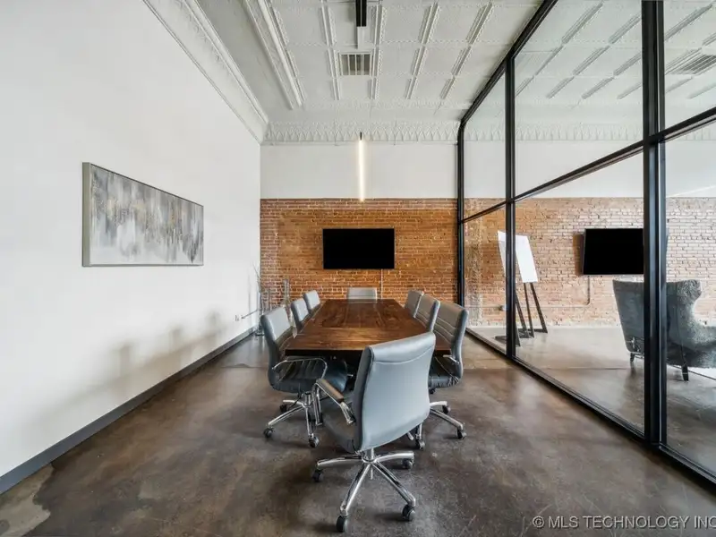 Historic Office Building with 9 Private Suites and Conference Room in Prime Location