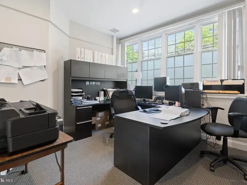 Historic 1921 Office Building in Wallingford with Ample Parking and Strong Investment Potential