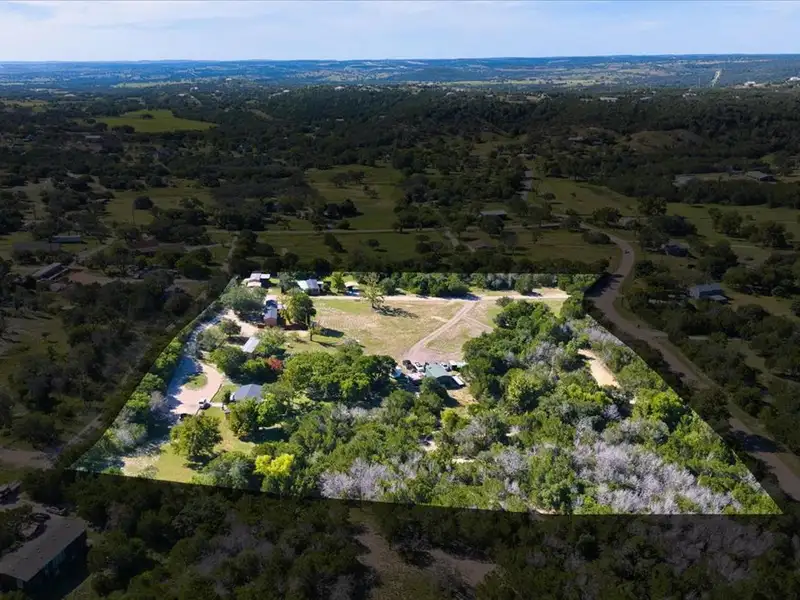 10-acre Mobile Home Community with 5 Units, Fenced, Workshop, and Growth Potential