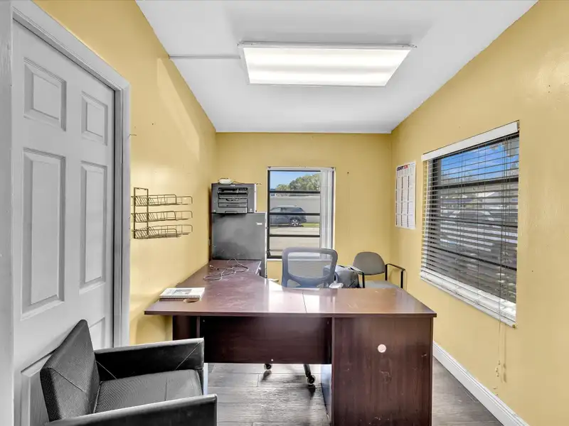 Commercial Property with Office Space and Residential Unit in Industrial Area