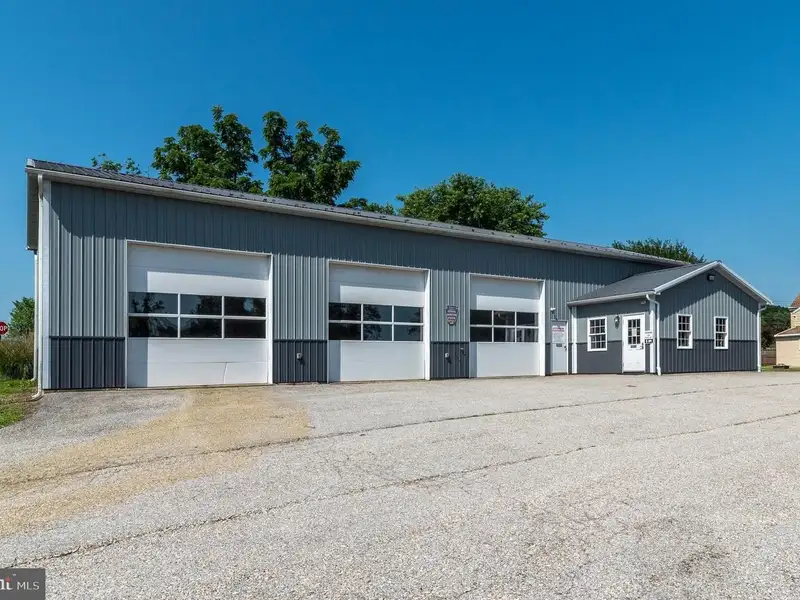 Auto Repair Shop with Residential Income Opportunity in Prime Location