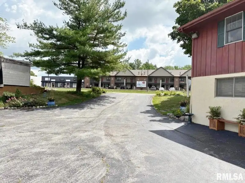 Versatile C-1 Zoned Property with 4 Bedrooms in Northwest Peoria Corner Lot