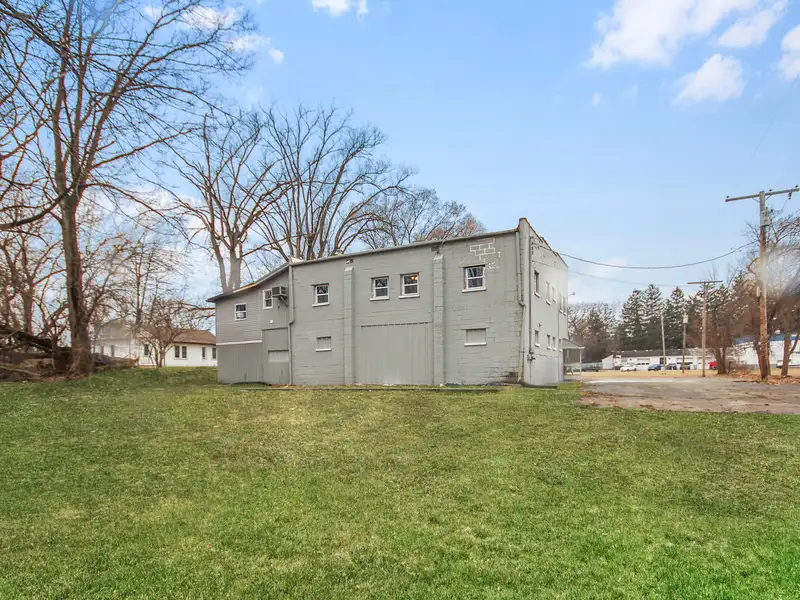 Mixed-use Two Unit Building with Remodeled Three Bedroom Apartment in Prime Location