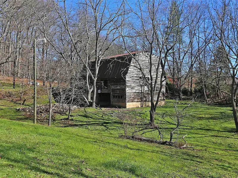 9.29 Acre Multi-family or Commercial Parcel in Waynesville Etj with City Utilities