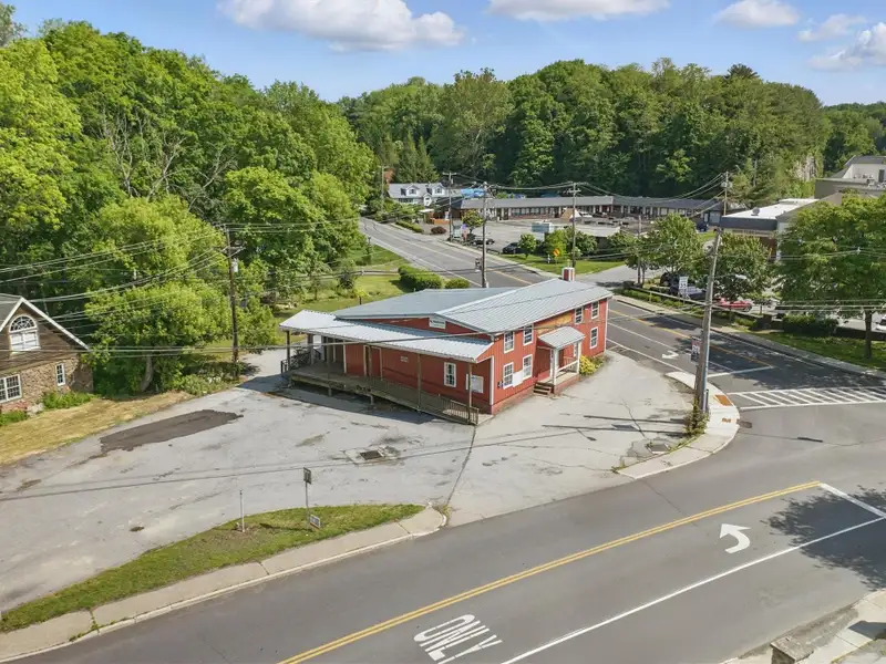 Commercial Retail/warehouse with Charming Colonial Home in High-traffic Corner Location