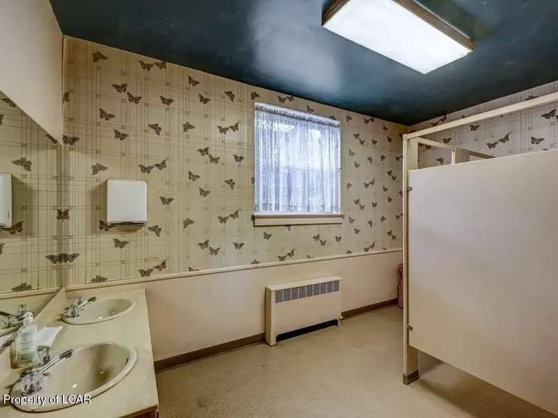 Versatile Downtown Hazleton Building: Former Worship Space with Offices/classrooms Potential