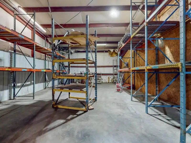 Commercial Property on Busy Highway - 2.1 Acres, 31,000 Sq Ft with Offices and Roll-up Doors