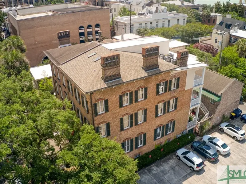 Restored 1871 Gray Brick Townhome in Savannah’s Historic District with Carriage House and Stvr Certificates