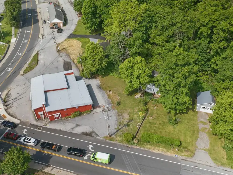 Commercial Retail/warehouse with Charming Colonial Home in High-traffic Corner Location