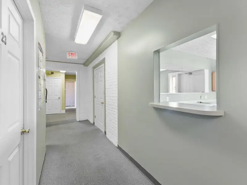 Versatile 4,305 Sq Ft Office Building with Apartment on Highway 11e