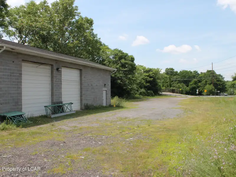 Former Municipal Building with Approved Plans for 12 or 15 Residential Units in Prime Location