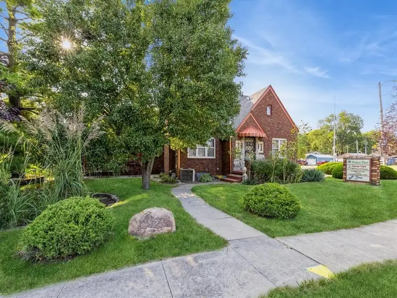 Vintage 4-bedroom Beaverdale Brick Home with Office Suites in Historic Valley Junction