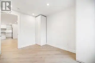 Renovated 2nd Floor Condo in Mid-town Toronto with Luxury Finishes and Modern Amenities