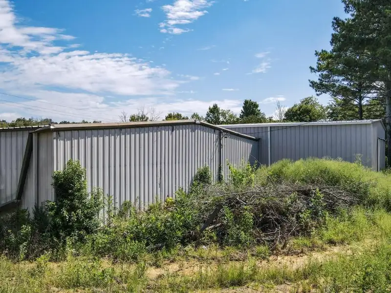 Commercial Property on Busy Highway - 2.1 Acres, 31,000 Sq Ft with Offices and Roll-up Doors