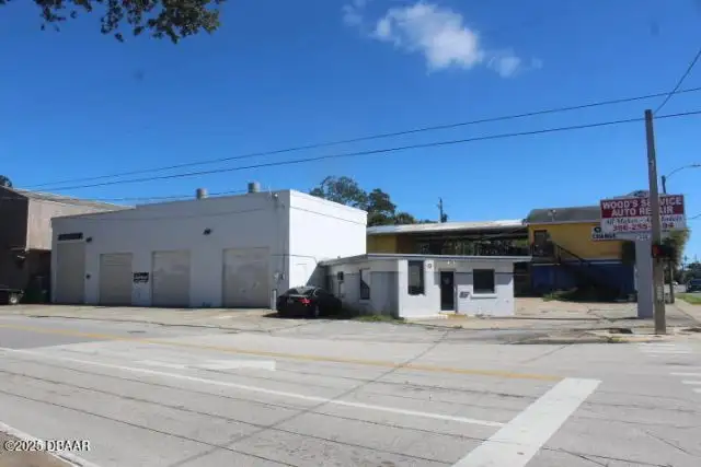 Freestanding Auto Repair Building on High Traffic Corner Lot in Mason Avenue