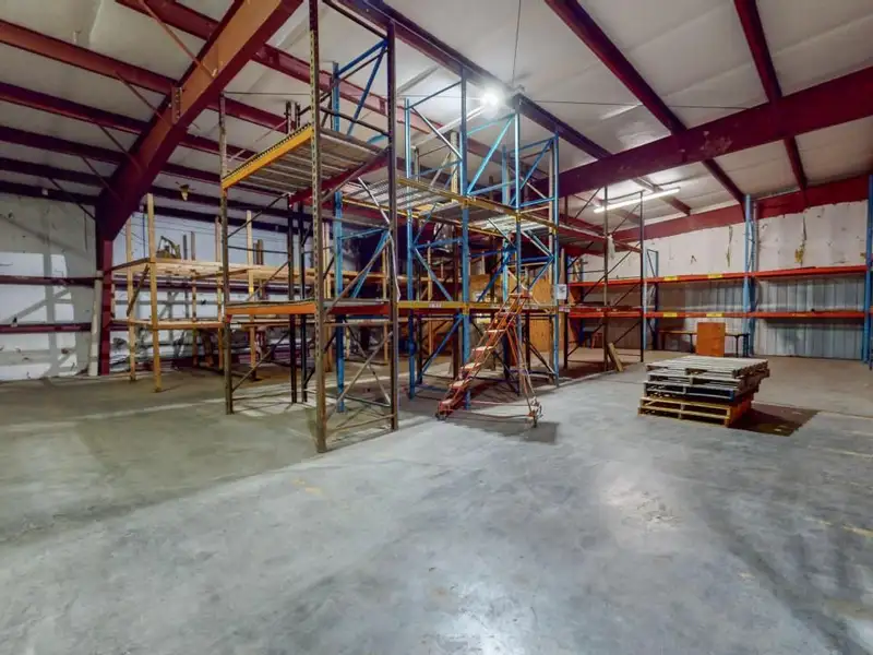 Commercial Property on Busy Highway - 2.1 Acres, 31,000 Sq Ft with Offices and Roll-up Doors