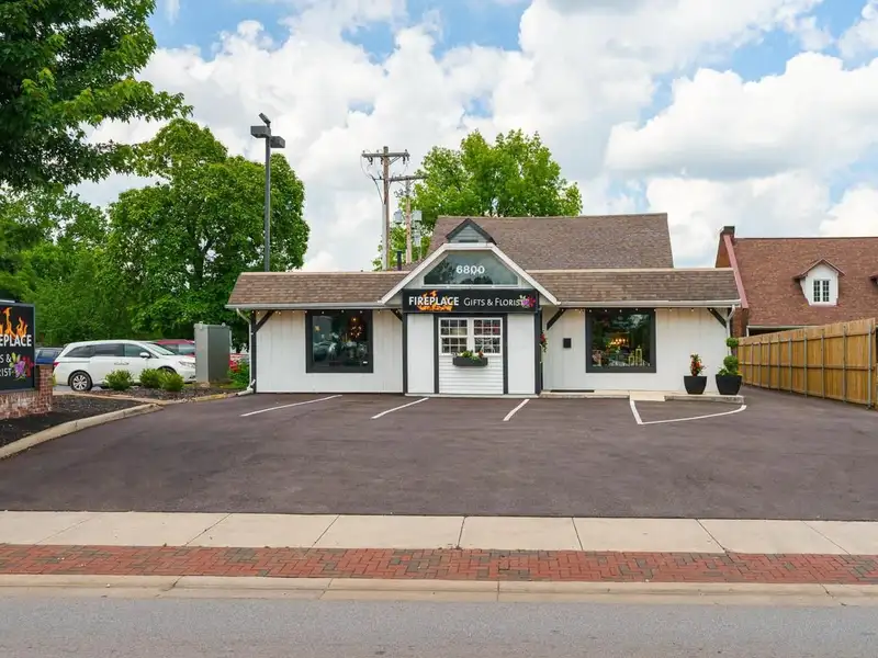 Prime Commercial Building in Downtown Reynoldsburg with Parking and Industrial Garage