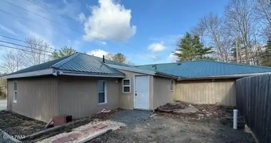 Versatile Commercial/residential Property with 2-bed Apartment and Office/retail Space on Route 6
