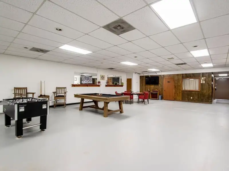 Office Space with Meeting Area, Kitchen, and Security Features in Convenient Location