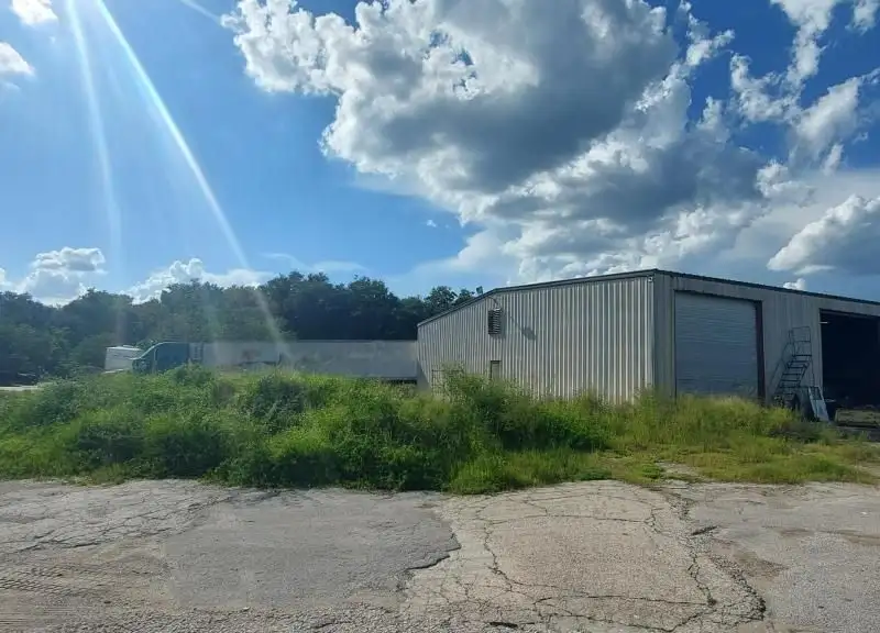 10.94-acre Commercial Property with 7,500 Sq Ft Warehouse on State Rd 46 Frontage