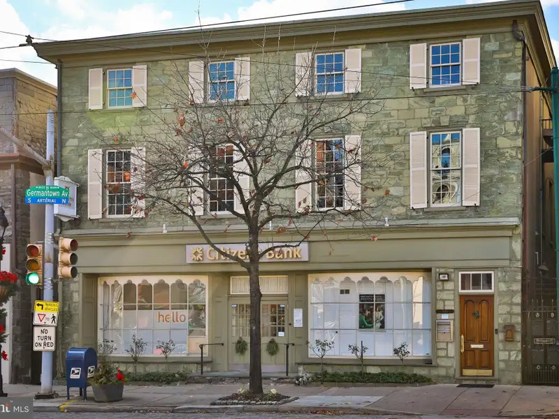 Historic Multi-use Building in Chestnut Hill Business District with Retail and Residential Units